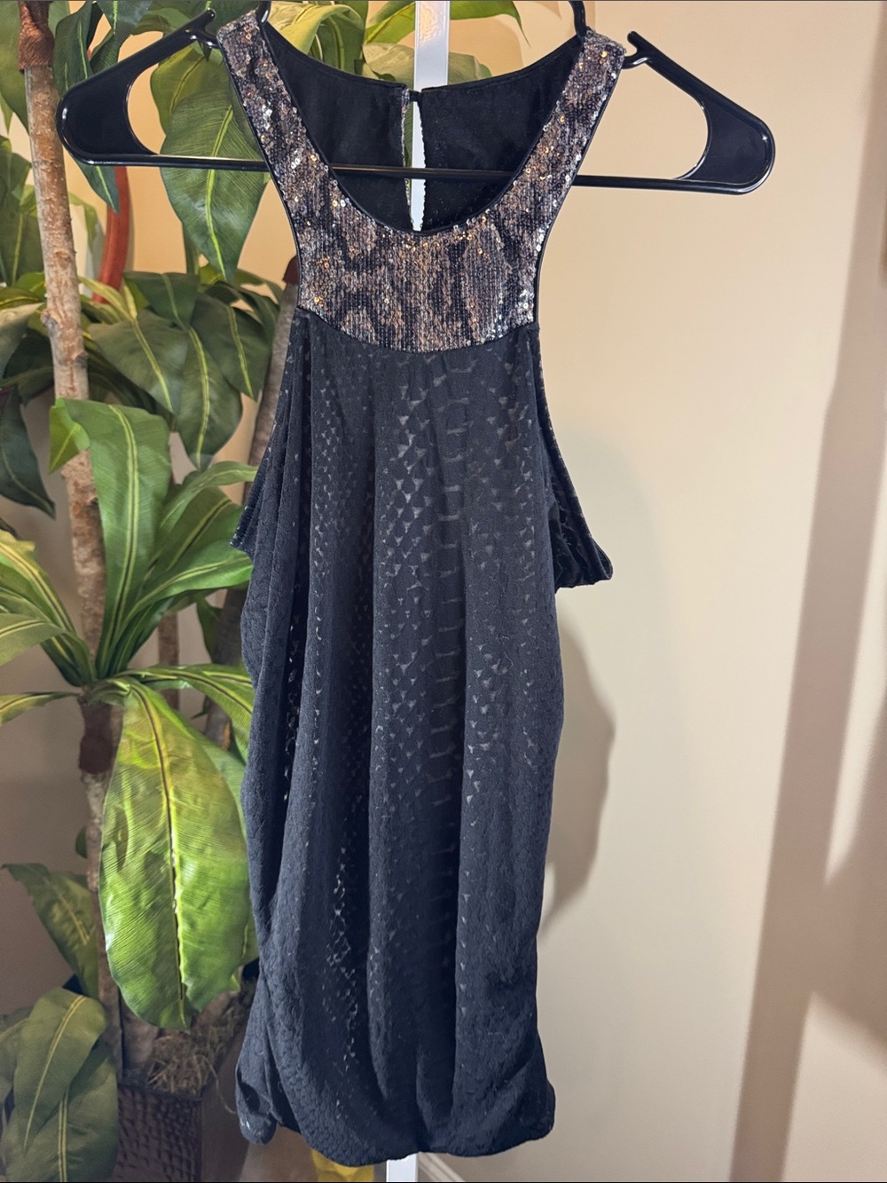 Black Sequin-Trim Sleeveless top. Express brand. Size M ruching sides.